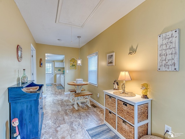 foyer entrance with baseboards