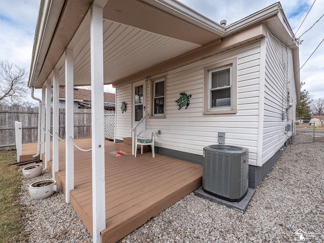 wooden deck with fence and central air condition unit