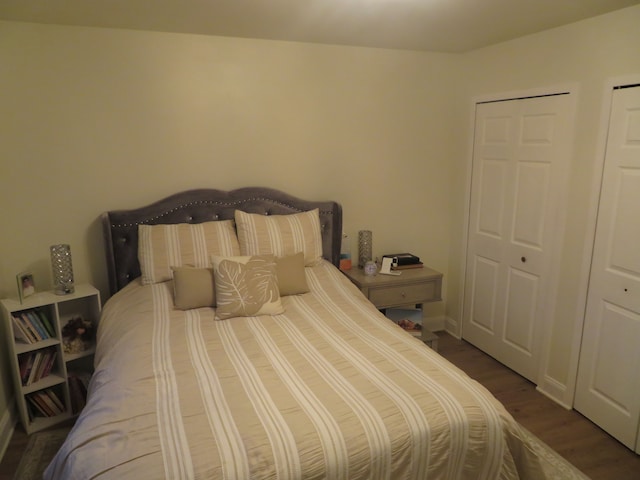 bedroom with wood finished floors