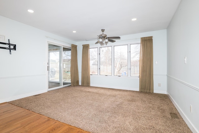 unfurnished room featuring carpet floors, recessed lighting, and baseboards