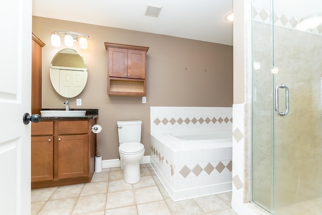 bathroom featuring visible vents, a shower stall, vanity, and tile patterned floors