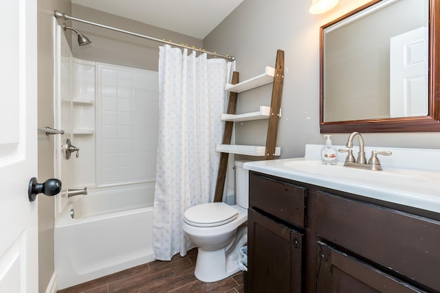 full bathroom featuring wood finish floors, vanity, toilet, and shower / tub combo with curtain