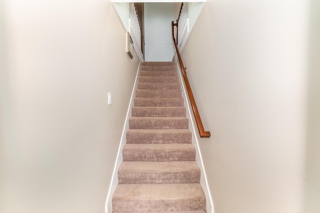 stairway with baseboards