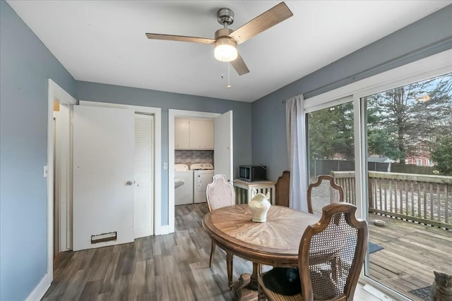 dining room with ceiling fan, baseboards, wood finished floors, and independent washer and dryer