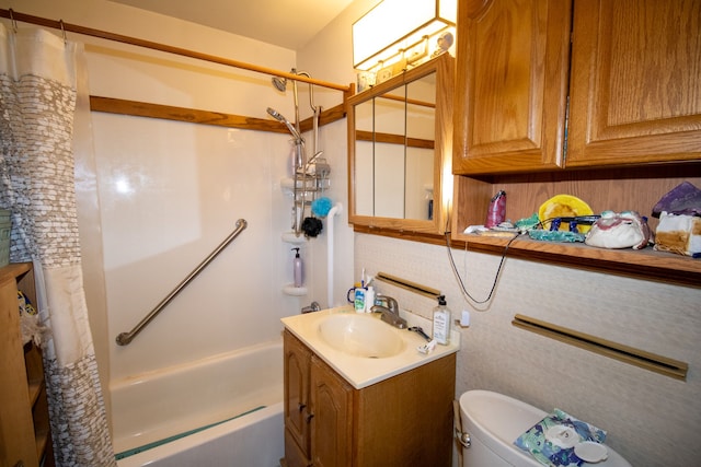 bathroom with toilet, shower / bath combo, and vanity