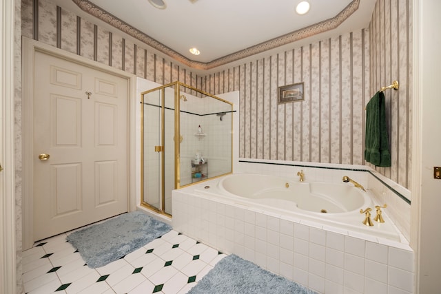 full bathroom featuring a shower stall, a whirlpool tub, and wallpapered walls