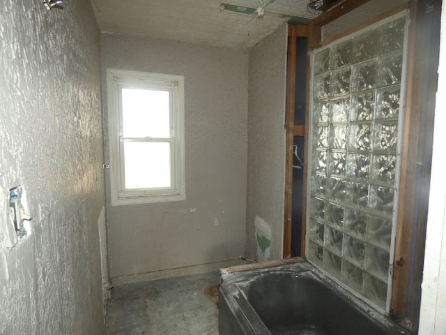 full bathroom featuring a bath