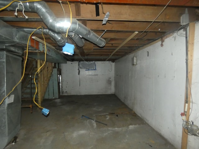 unfinished basement with heating unit