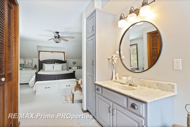 bathroom with vanity and a ceiling fan