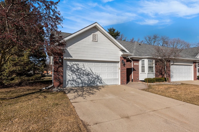 ranch-style house with a shingled roof, concrete driveway, a front lawn, a garage, and brick siding