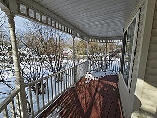 view of snow covered deck