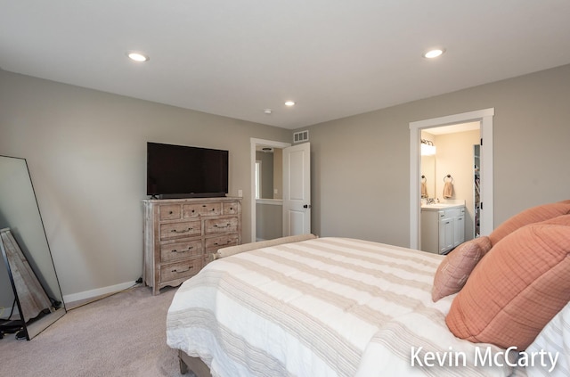 bedroom featuring light carpet, baseboards, visible vents, and recessed lighting