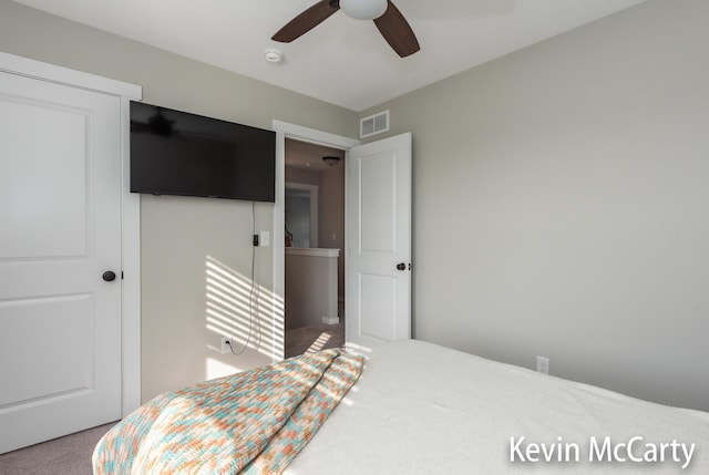 bedroom featuring ceiling fan and visible vents