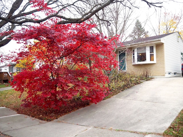 view of home's exterior featuring brick siding