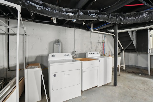 clothes washing area with laundry area and separate washer and dryer