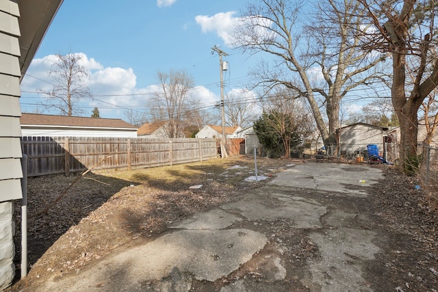 view of yard with a patio area and a fenced backyard