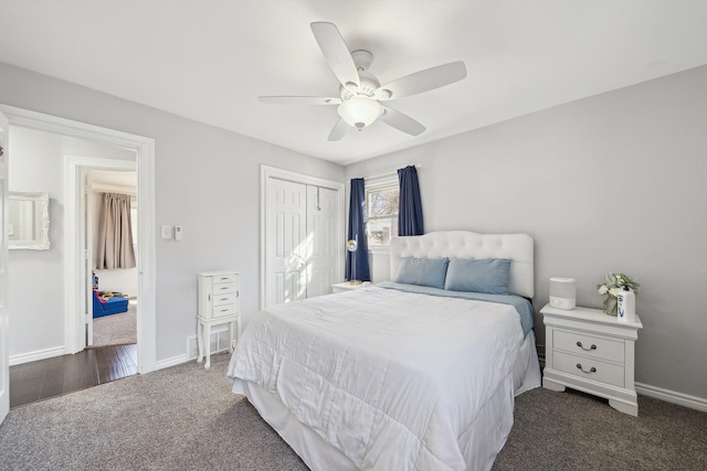 bedroom with a closet, carpet, a ceiling fan, and baseboards