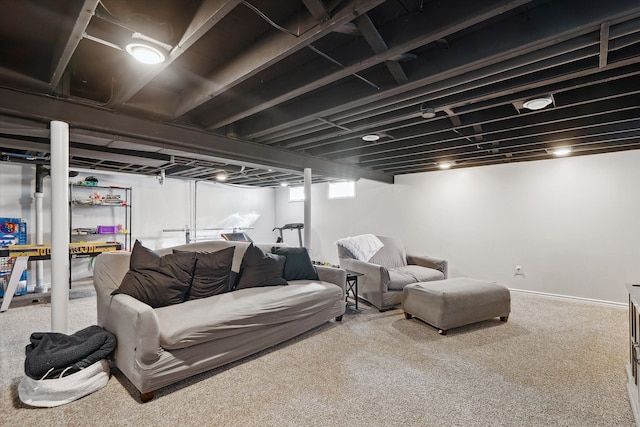 basement with carpet flooring and baseboards