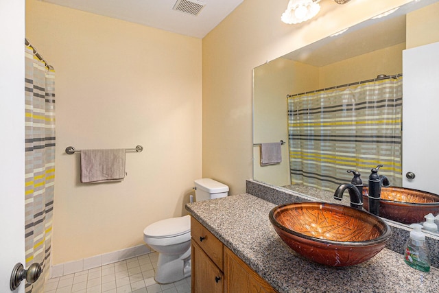 full bath with visible vents, baseboards, toilet, tile patterned flooring, and vanity