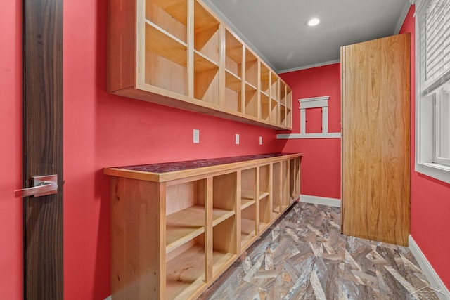 bar with ornamental molding, recessed lighting, and baseboards