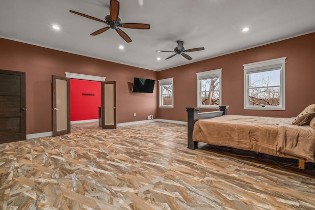 bedroom with recessed lighting and baseboards