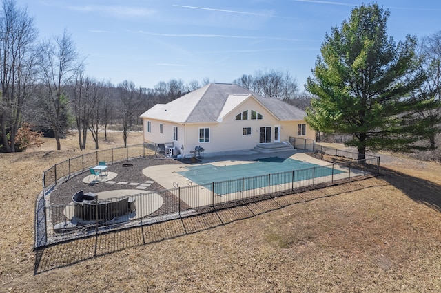 view of pool with a patio, a fenced in pool, and fence