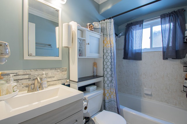 full bath featuring shower / bathtub combination with curtain, toilet, and vanity