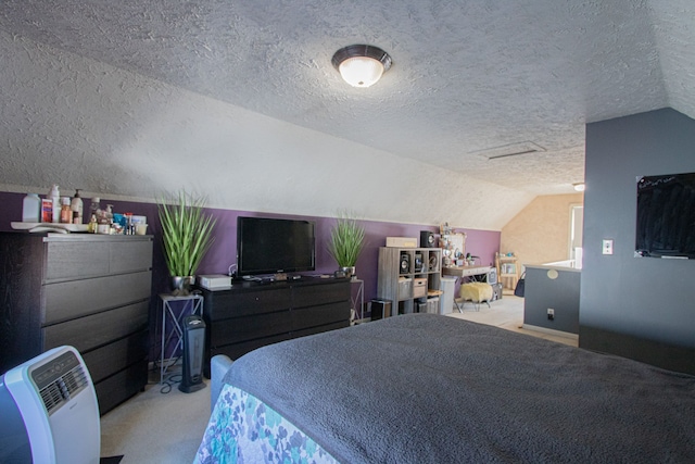 carpeted bedroom with vaulted ceiling and a textured ceiling