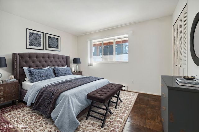 bedroom featuring baseboard heating and baseboards