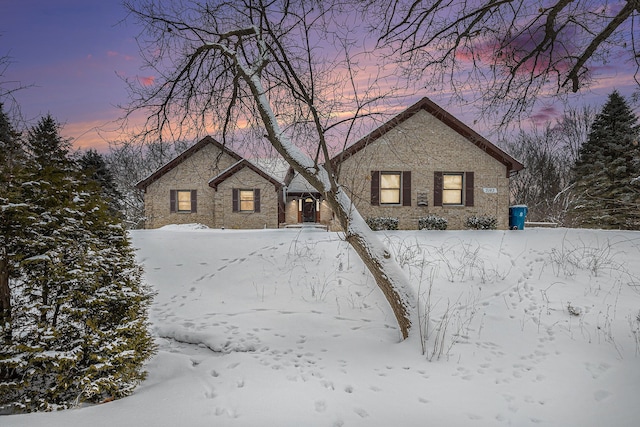 view of snow covered house