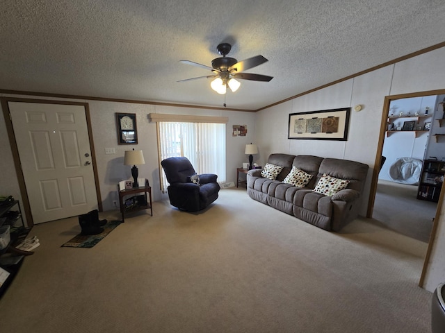 living room featuring ceiling fan, a textured ceiling, carpet flooring, vaulted ceiling, and ornamental molding