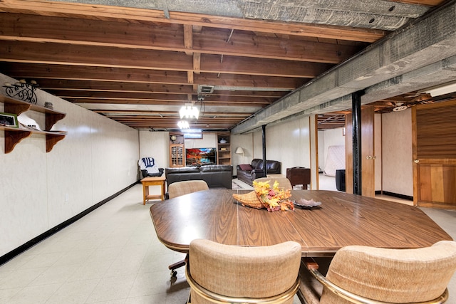 dining room featuring tile patterned floors and baseboards