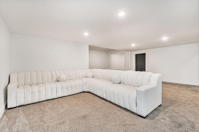 living room featuring baseboards, carpet floors, and recessed lighting