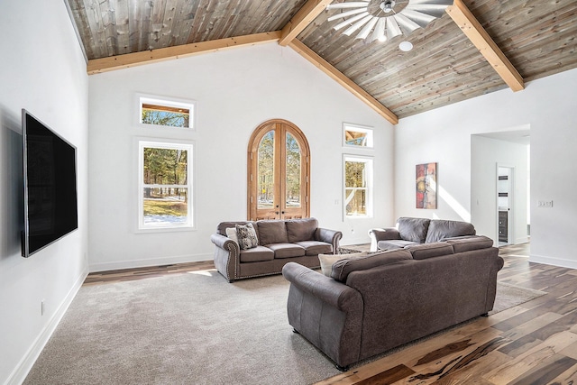 living room featuring wood ceiling, wood finished floors, high vaulted ceiling, beamed ceiling, and baseboards