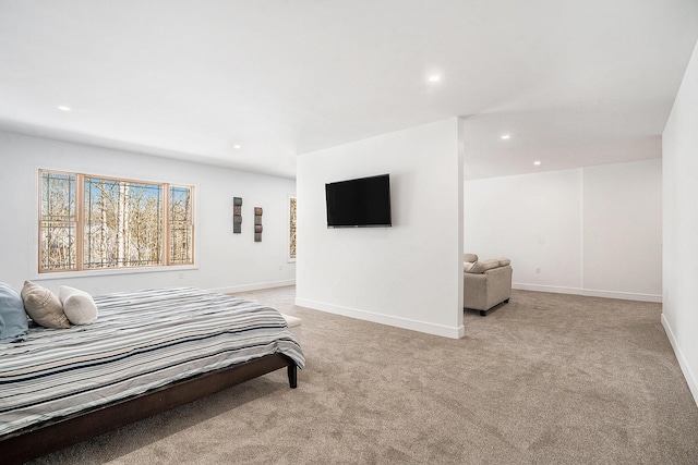 bedroom with recessed lighting, baseboards, and light colored carpet