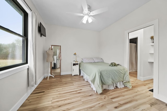 7450 Sears Rd, Horton, MI 49246 - bedroom featuring a ceiling fan, light wood-style flooring, and baseboards