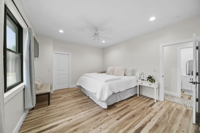 7450 Sears Rd, Horton, MI 49246 - bedroom featuring baseboards, light wood-type flooring, a ceiling fan, and recessed lighting