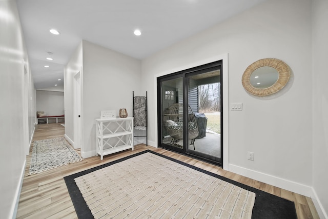 7450 Sears Rd, Horton, MI 49246 - interior space with recessed lighting, wood finished floors, and baseboards
