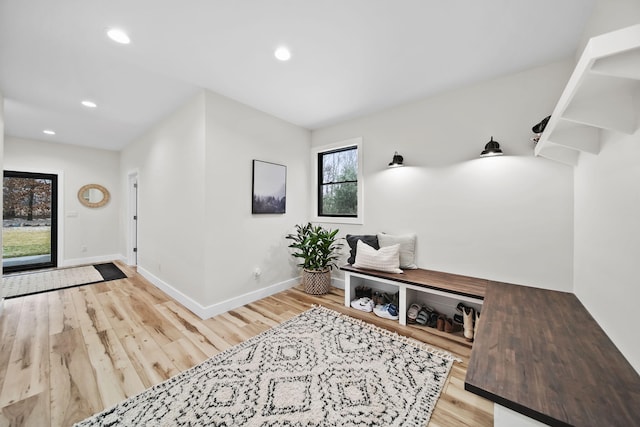 7450 Sears Rd, Horton, MI 49246 - mudroom with baseboards, wood finished floors, and recessed lighting
