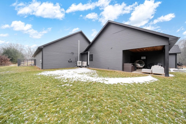7450 Sears Rd, Horton, MI 49246 - rear view of property featuring a lawn