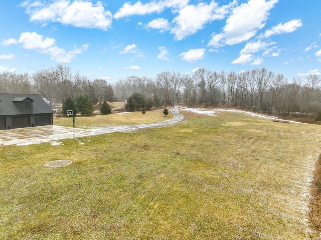 7450 Sears Rd, Horton, MI 49246 - view of yard featuring a garage