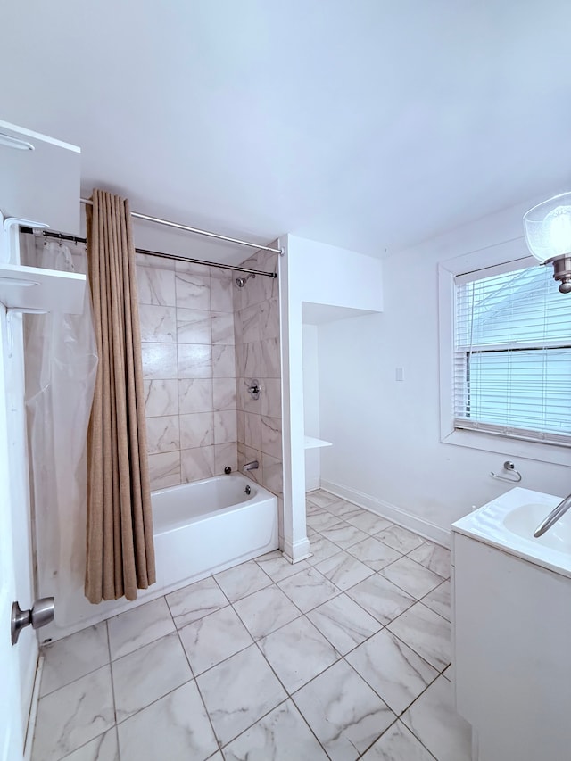 bathroom with shower / bath combination with curtain and baseboards