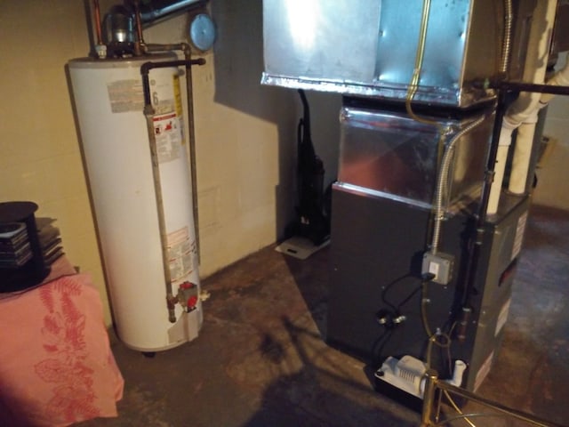 utility room featuring gas water heater