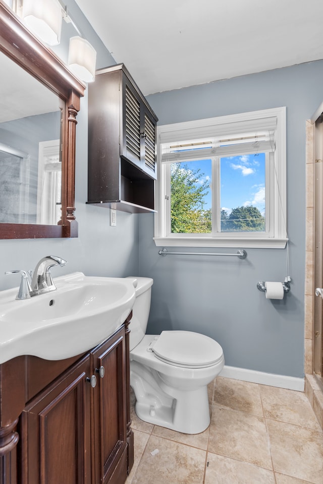 34134 Dequindre Rd, Sterling Heights, MI 48310 - full bathroom featuring toilet, baseboards, vanity, and an enclosed shower