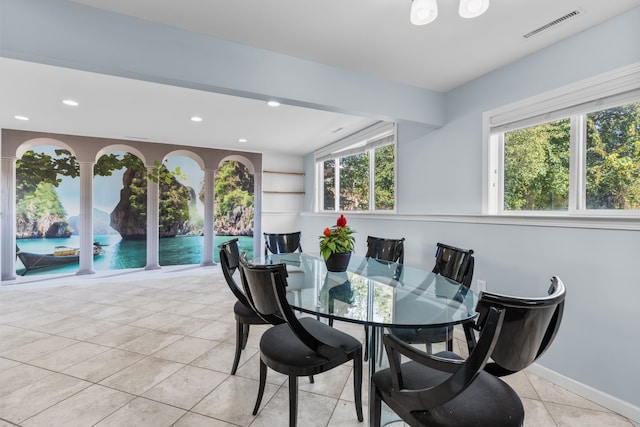 dining space featuring recessed lighting, visible vents, baseboards, and light tile patterned floors