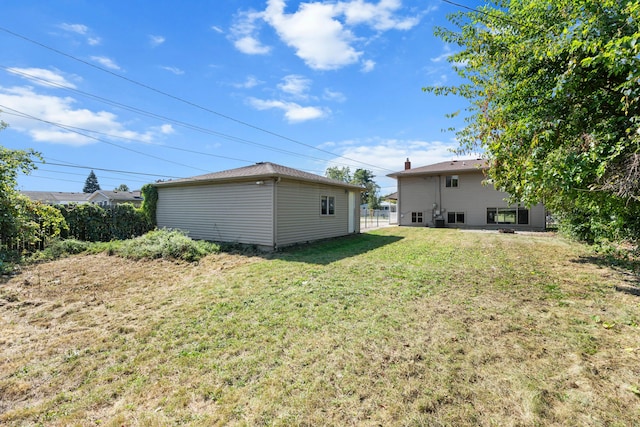34134 Dequindre Rd, Sterling Heights, MI 48310 - view of grassy yard with an outdoor structure