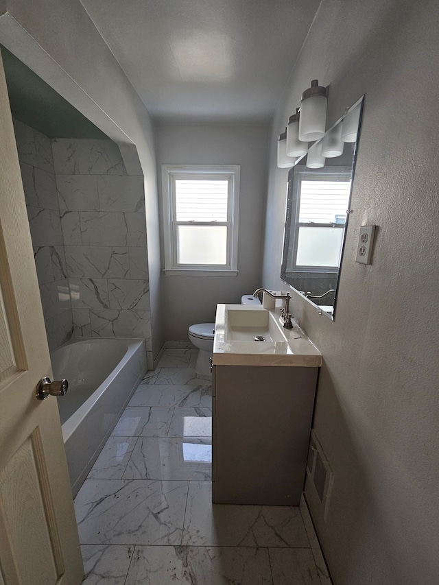 full bath with toilet, marble finish floor, visible vents, and vanity