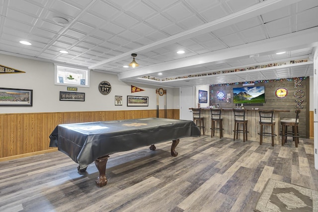 rec room featuring a dry bar, billiards, wainscoting, wood finished floors, and wood walls