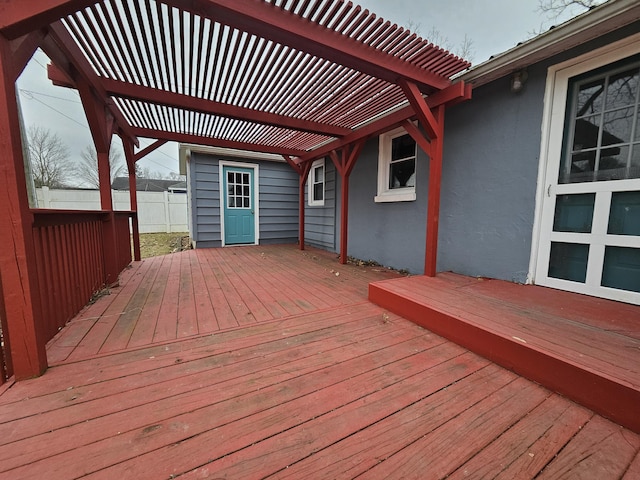 wooden deck with fence and a pergola