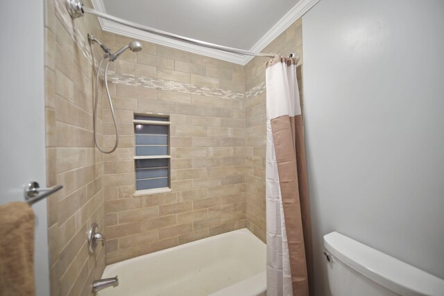 bathroom with shower / bath combo, toilet, and crown molding